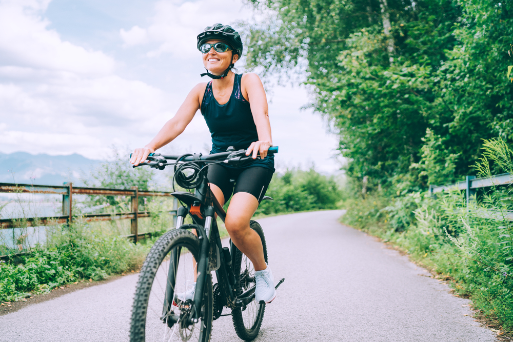 Portrait,Of,A,Happy,Smiling,Woman,Dressed,In,Cycling,Clothes,