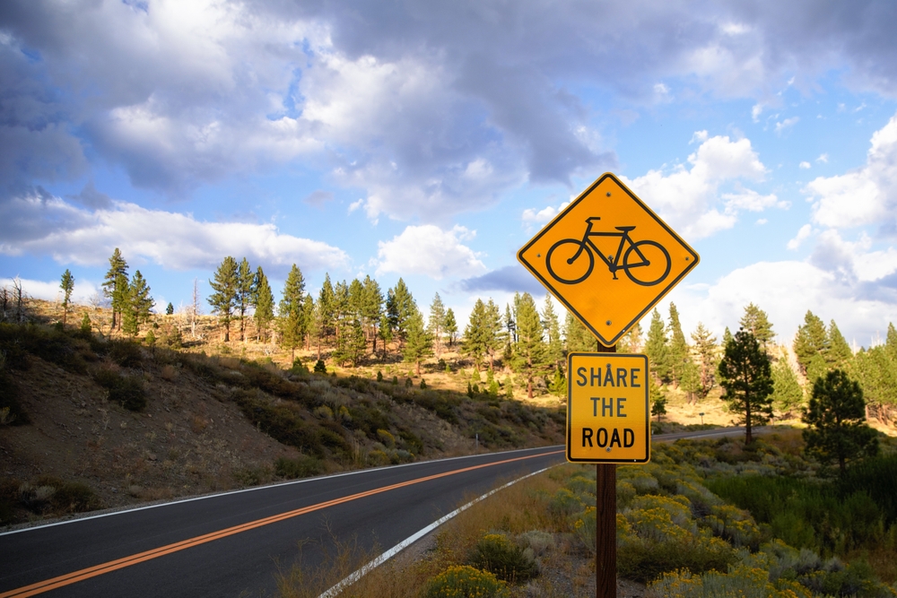 Share,The,Road,Bike,Sign,On,Paved,Road,Going,Uphill