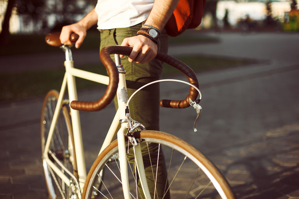 Young,Hipster,Style,Man,Posing,With,Bicycle,On,The,Street