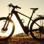 Backlit,Ebike,In,Silhouette,At,Sunset
